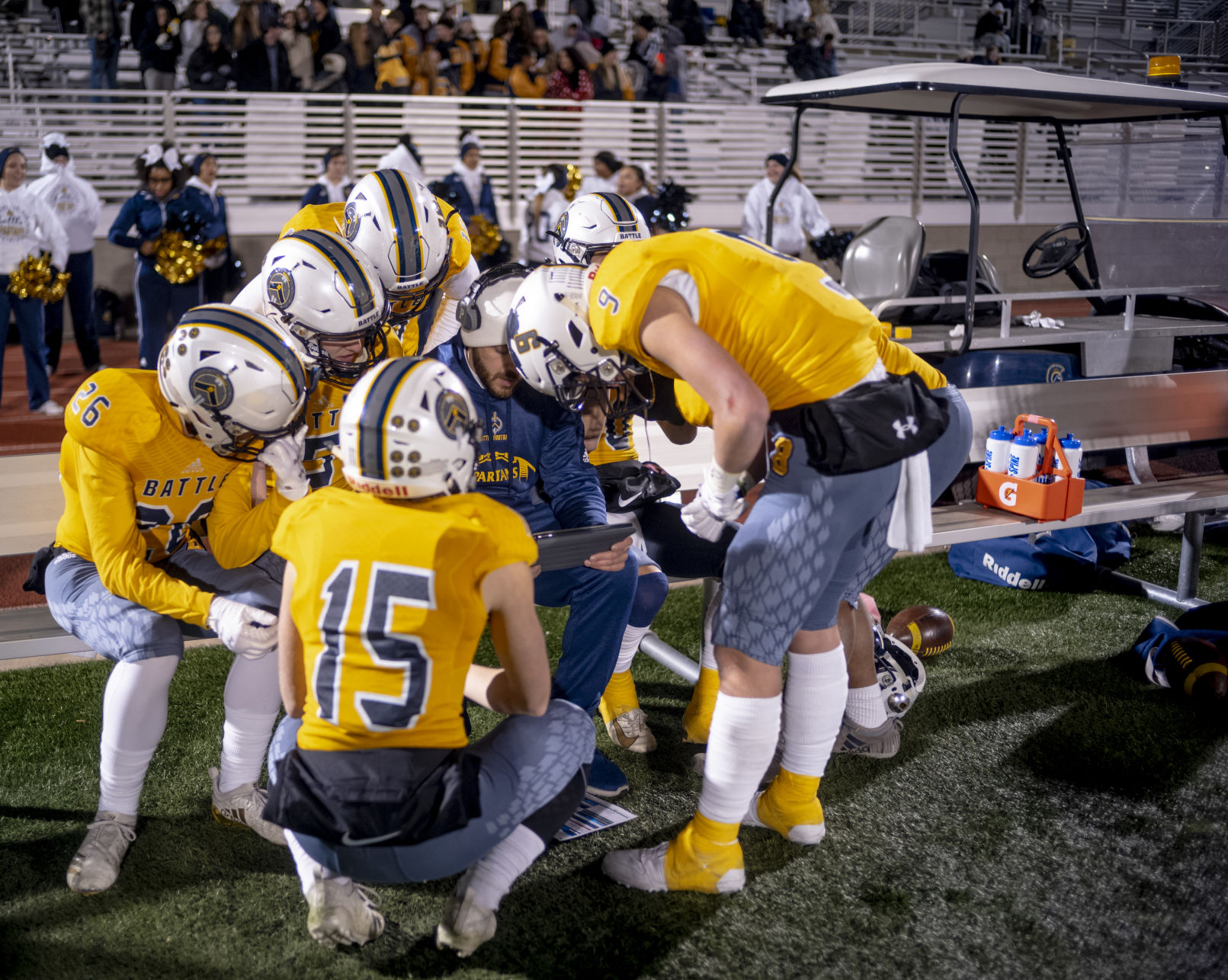 Battle High School's offense huddles